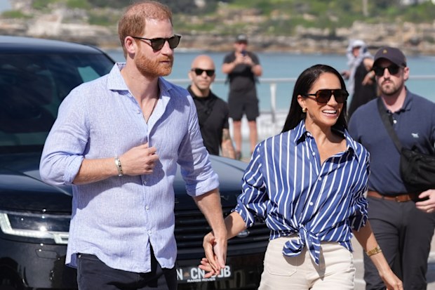 SYDNEY, AUSTRALIA - APRIL 17: Prince Harry, Duke of Sussex and Meghan, Duchess of Sussex arrive to meet volunteer first responders from Bondi Surf Bathers' Life Saving Club, during a visit to Bondi Beach, on day four of the royal trip to Australia on April 17, 2026 in Sydney, Australia. Volunteers from the organisation, founded in 1907, played an integral role in protecting beachgoers and saving lives during the terrorist attack at Bondi Beach on December 14. (Photo by Jonathan Brady-Pool/Getty 