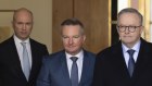 Matt Kean, Energy Minister Chris Bowen and Prime Minister Anthony Albanese at a press conference on Monday.