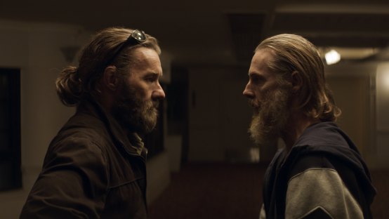 Joel Edgerton and Sean Harris in The Stranger.