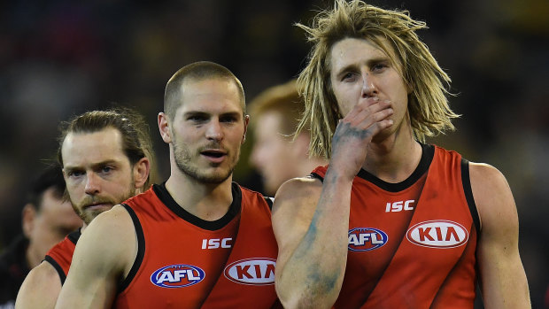 All over: (from left) Travis Colyer, David Zaharakis and Dyson Heppell, as Richmond ended their finals dream.