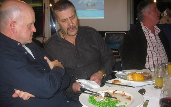 Mark “Chopper” Read with John Silvester. The peas were overcooked. Bernie “the attorney” Balmer looks the other way.