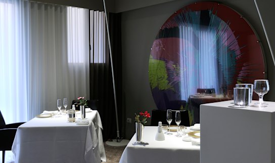 The disc is a Damien Hirst artwork at Osteria Francescana. 