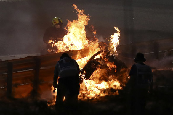 Grosjean's car burns after he escaped the crash.