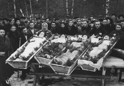 An undated photo from Faye Schulman, via Second Story Press, of Jewish and Russian members of the Resistance who were buried in a single grave in 1943. 