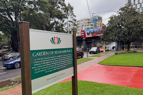 The large electronic billboard is on a railway bridge in Chatswood across the street from the Garden of Remembrance.
