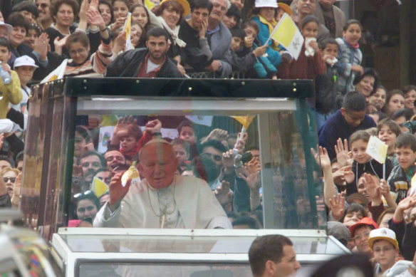 Pope John Paul II in his famous popemobile. Young Megan did not see this.
