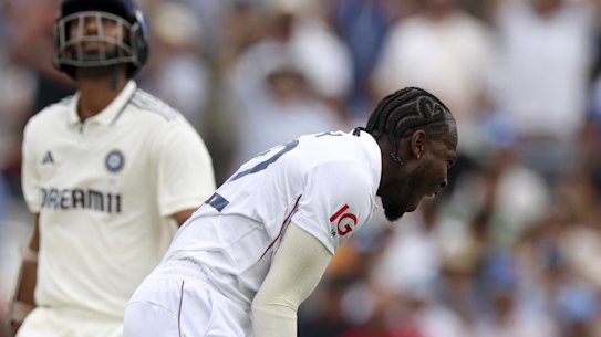 England's Jofra Archer, right, celebrates the dismissal of India's Washington Sundar.