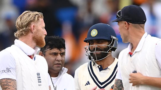 Ben Stokes (left) and Ravindra Jadeja exchange words at the end of the match.