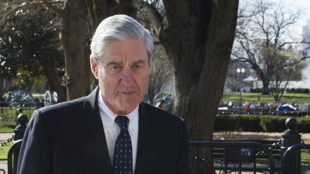 Special Counsel Robert Mueller walks past the White House after attending St John's Episcopal Church in Washington. 
