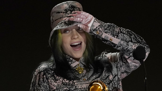 Billie Eilish reacts as she accepts the award for record of the year for Everything I Wanted at the Grammys.