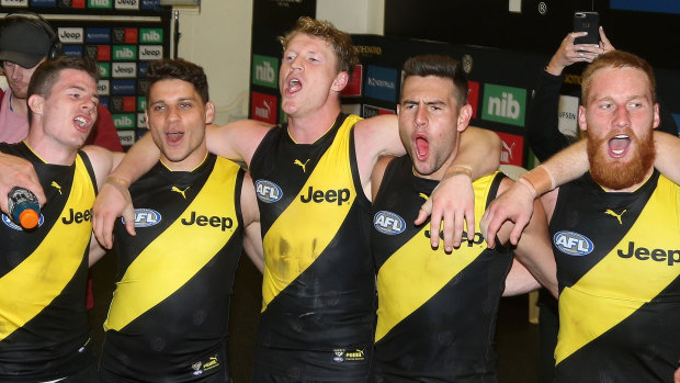 The Tigers celebrate their crushing win over Fremantle last weekend.