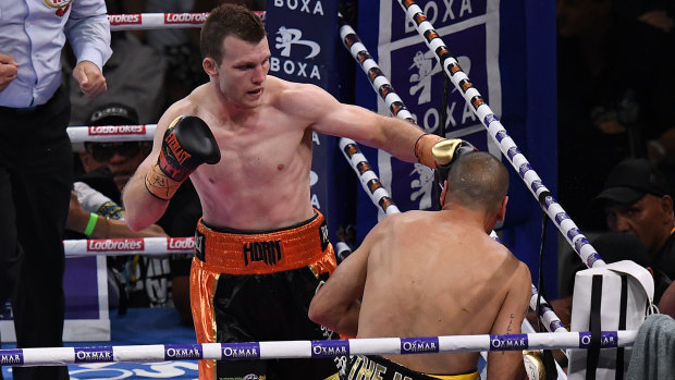 All over: Anthony Mundine is knocked down by Jeff Horn.