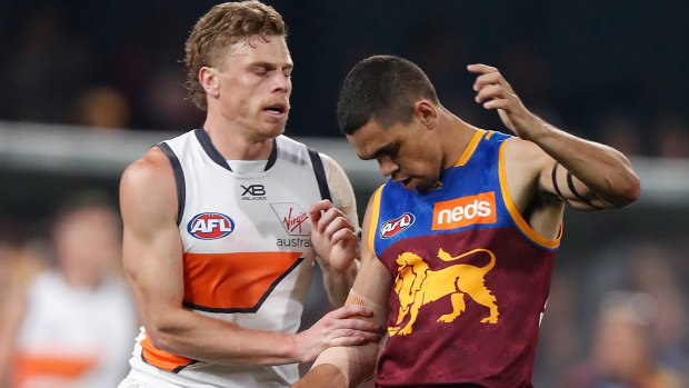 Cruel blow: Giants' Adam Kennedy makes contact with Charlie Cameron's injured elbow.