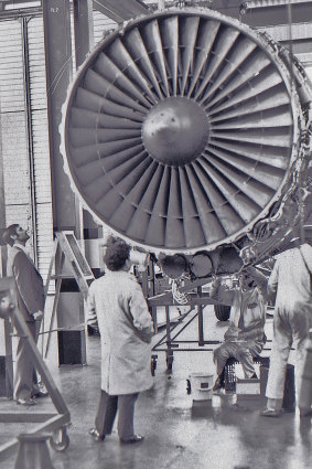 John Bibo inspects a Rolls-Royce RB 211 bypass fan.