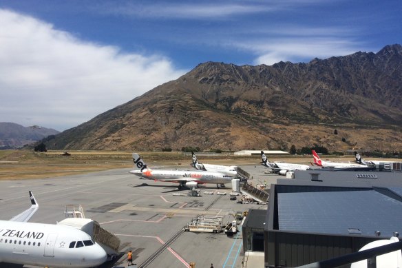 On the ground in Queenstown, New Zealand, with The Remarkables Range in the background.