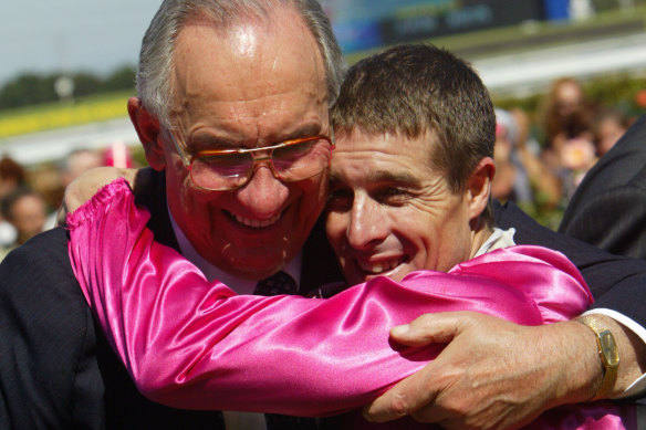 Bob Ingham embraces jockey Darren Beadman after Lonhro's victory in the 2004 Australian Cup at Flemington.