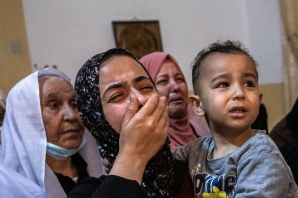 Relatives of Palestinian Ahmed al-Shenbari, who was killed during an Israeli raid in Beit Hanoun, Gaza Strip, mourn during his funeral on Tuesday.