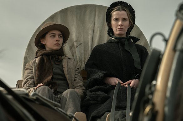 Preston Mota as Devin Rowell and Betty Gilpin as his mother Sara in American Primeval.