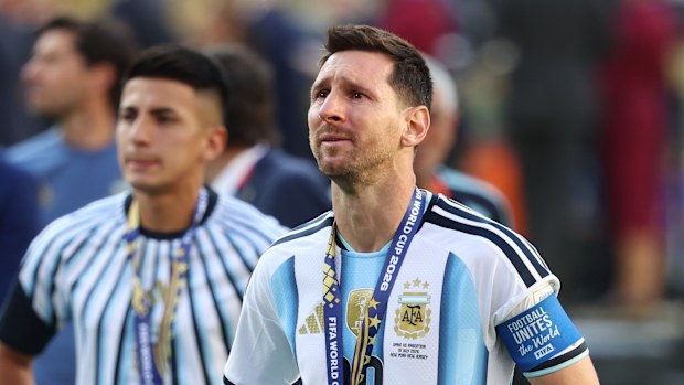 Messi is emotional after getting his medal.