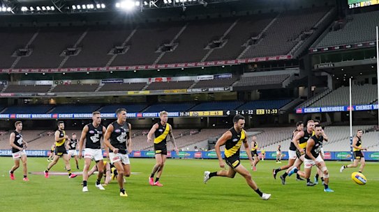 The sound and the fury: Richmond and Carlton in action at an empty MCG.
