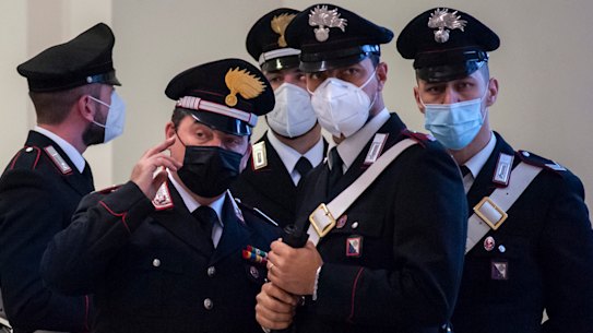 Italian police arrested 17 people in connection with the mafia-run courthouse cafe.