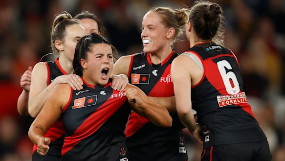 Bomber Maddy Prespakis, a childhood Essendon fan, celebrates a goal.