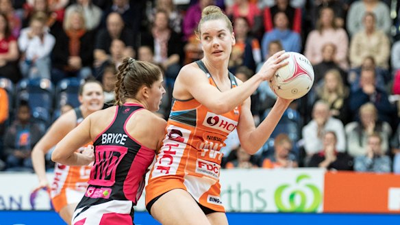 Thunderbirds' Kaitlyn Bryce and Giants' Kiera Austin. in action on Sunday. 