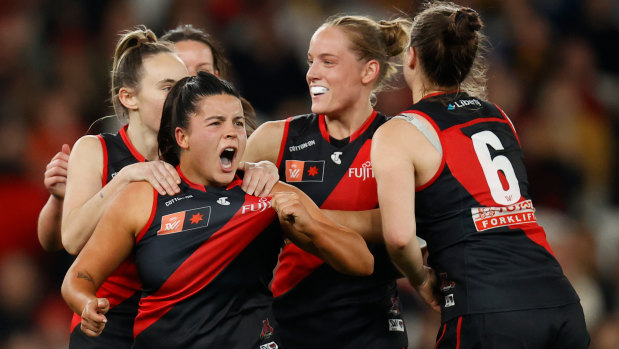 Bomber Maddy Prespakis, a childhood Essendon fan, celebrates a goal.