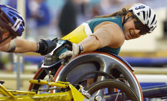 Louise Sauvage receives the  congratulations of Jean Driscoll of the United States after winning the 1500-metre final of the Sydney Paralympic Games.