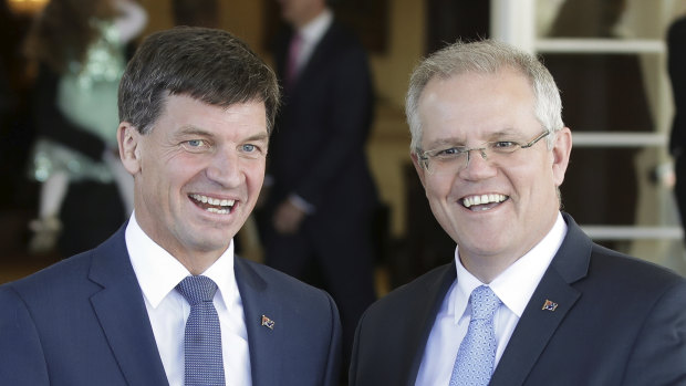Prime Minister Scott Morrison, with Energy Minister Angus Taylor, at the swearing-in of his new ministry after the Liberal leadership spill in August.