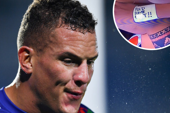 Kane Evans and the obscene message on his wrist strapping.