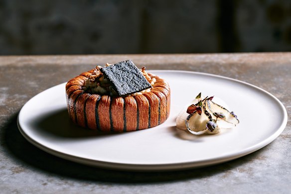 The miso beef halo served with parsnip puree, pickled daikon and charred onion, horseradish cream and puffed wild rice.