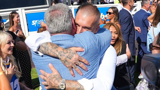 Former Richmond champion Dustin Martin embraces trainer Clinton McDonald after the Blue Diamond Stakes.