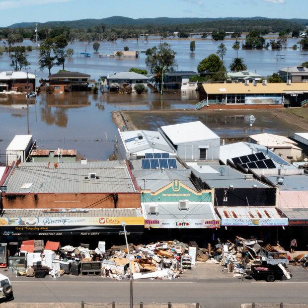 The shops along the main street of Woodburn have all their destroyed goods on the footpath