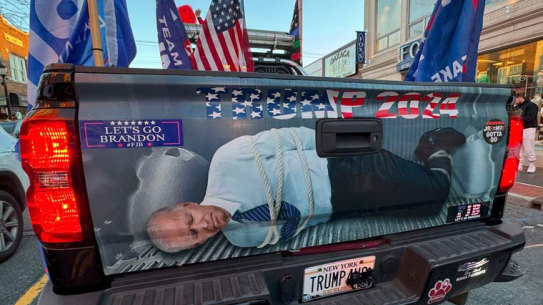 A hog-tied US President Joe Biden, as seen in the video released on Donald Trump’s website,.