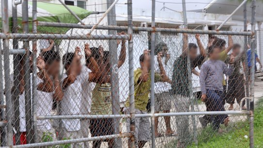 People seeking asylum in a detention centre on Manus Island in 2014.