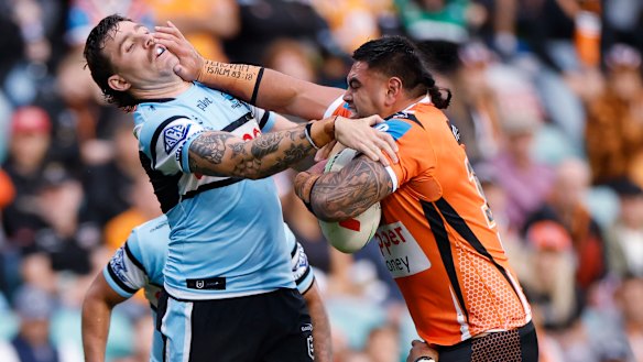 Royce Hunt of the Wests Tigers takes a carry.