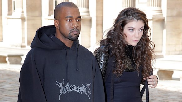 In happier times (although it might not look like it): Kanye West and Lorde at the Christian Dior's Paris Fashion Week show in 2015.