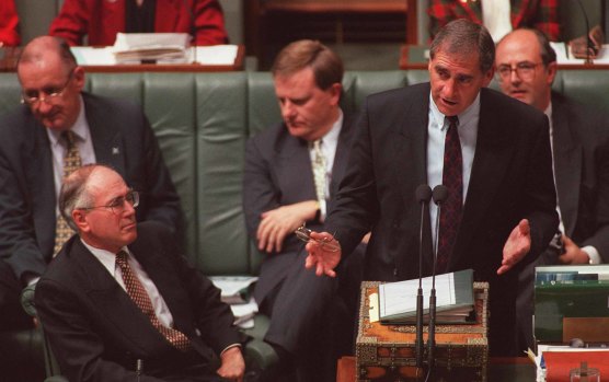 Then-Finance Minister John Fahey with Prime Minister John Howard in Federal Parliament in 1996.