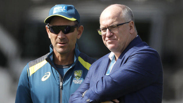 Justin Langer with Cricket Australia chairman Earl Eddings (right).