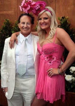 Geoffrey Edelsten with his then wife Brynne on Melbourne Cup Day.