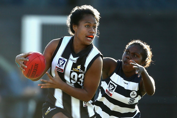 Catch me if you can: Vaomua Laloifi pictured playing for Collingwood in 2018. 