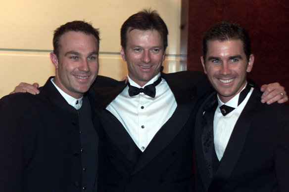 Michael Slater (left), with then-Australian captain Steve Waugh and Justin Langer at the 2001 Allan Border Medal, had used sport to “overcome” childhood trauma.