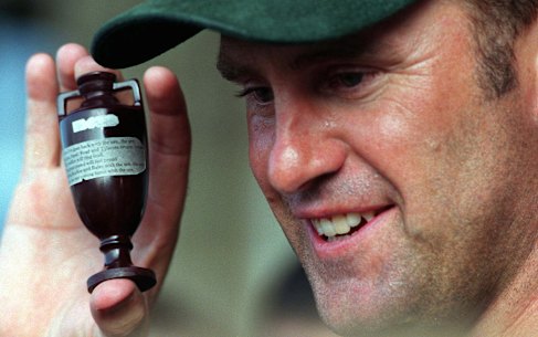 Australia’s cricket captain Mark Taylor holds the Ashes after Australia won the series 3-2.