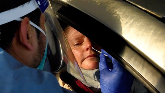 Laverty Pathology staff conducting COVID-19 tests at the Roselands drive through testing clinic, earlier this month.