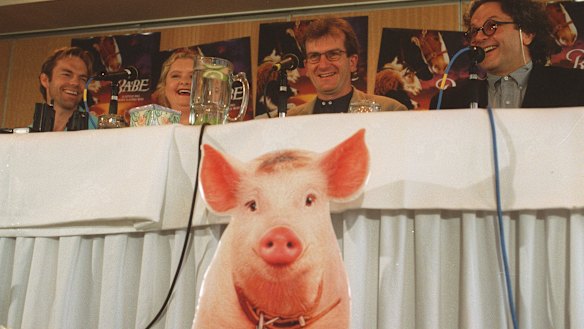 Director Chris Noonan, third from left, with Hugo Weaving, Magda Szubanski and producer George Miller launch Babe in 1995.

