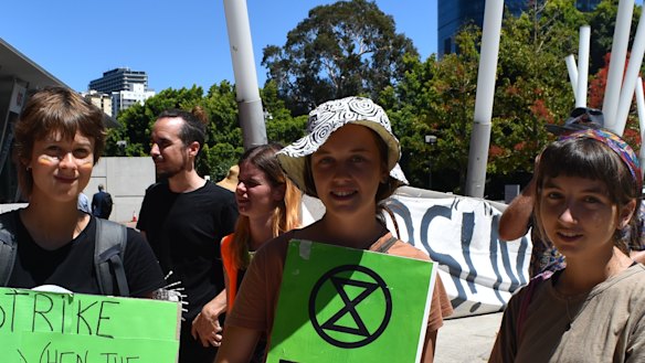 Protesters add their own imagery to the logos of the delegates at the recent Resources Technology Showcase in Perth. 