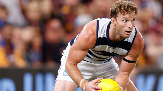 On the ball: Lachie Henderson in action for Geelong during their preliminary final win over Brisbane.