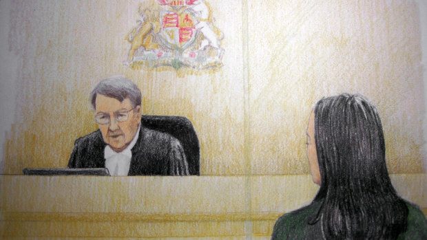 In this courtroom sketch, Meng Wanzhou, right, the chief financial officer of Huawei Technologies, listens to the judge during a bail hearing in Vancouver, Canada.