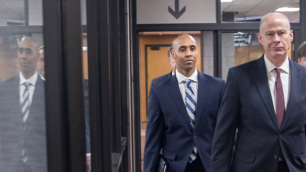 Former Minneapolis police officer Mohamed Noor, left, and his lawyer, Thomas Plunkett, after a pretrial motions hearing on Friday.